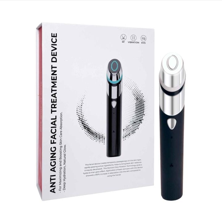 Anti-aging facial treatment device with packaging on a white background