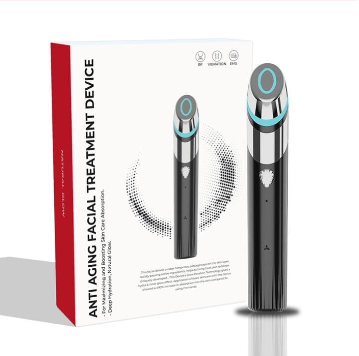 Anti-aging facial treatment device with packaging on a white background
